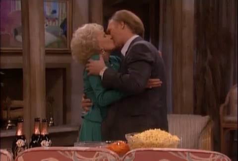 Marius Weyers and Betty White kiss on the set of Golden Girls 