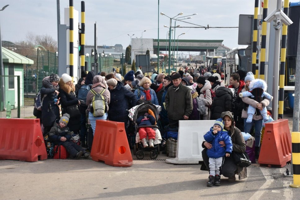 Refugees entering Poland from Ukraine at the Medyka border crossing point